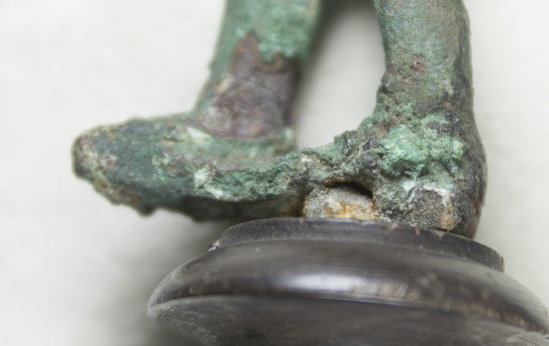 Hearst Museum object 11 of 19 titled Statue fragment, accession number 8-3472, described as Cast bronze fragment of male forehead preserving locks of hair