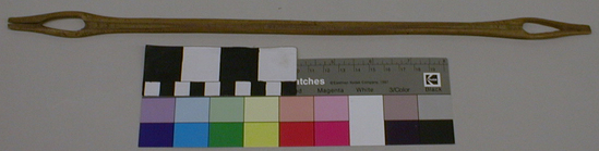 Hearst Museum object titled Shuttle, accession number 1-9491, described as Netting shuttle, wood, handcarved with oval opening and slot at each end.  Polished from use.