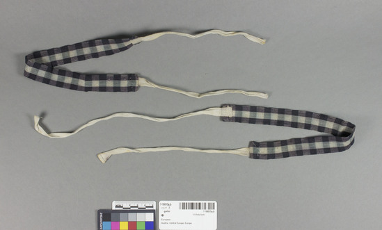 Hearst Museum object titled Garter, accession number 7-10015a,b, no description available.