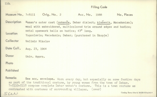 Documentation associated with Hearst Museum object titled Outer coat, accession number 7-5111, described as Woman's outer coat (zobance, Debar dialect; Klasenik, Macedonian); wool with embroidered, multicolored trim around edges and bodice; metal openwork balls on bodice; 43 inches long