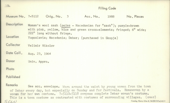 Documentation associated with Hearst Museum object titled Sash, accession number 7-5112, described as Woman’s wool sash ( pojas-Macedonian for “sash”); purple-brown with pink, yellow, blue and green cross-elements; fringed; 6 inches wide; 222” long without fringe