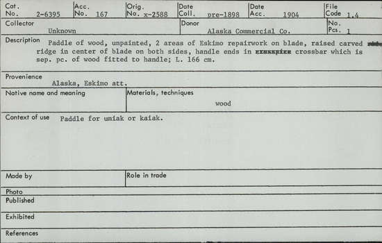 Documentation associated with Hearst Museum object titled Paddle, accession number 2-6395, described as Paddle of wood, unpainted, 2 areas of Eskimo repairwork on blade, raised carved ridge in center of blade on both sides, handle ends in crossbar which is separate piece of wood fitted to handle.