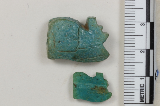 Hearst Museum object 20 of 22 titled Amulets, accession number 6-22037, described as amulets, of blue faience, and one pyramidal seal of steatite