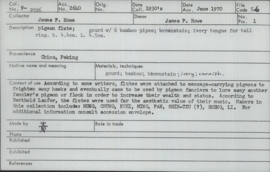 Documentation associated with Hearst Museum object titled Pigeon flute, accession number 9-9596, described as pigeon flute; gourd w/6bamboo pipes; brownstain;ivory tongue for tail ring. ht. 4.4 cm. L. 4.5 cm.