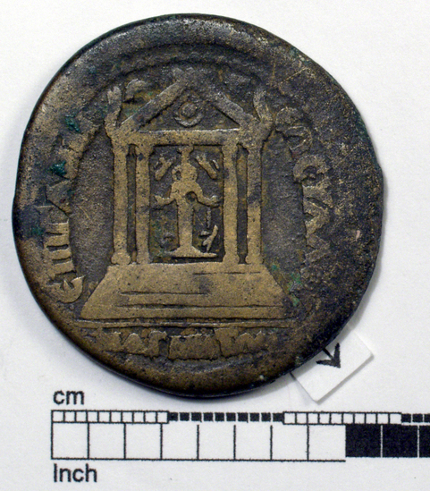 Hearst Museum object 2 of 6 titled Coin: æ, accession number 8-4931, described as Coin; AE; Greek. 17.15 grams, 32.4 mm. Caracalla, 211-217 AD. Magnesia, Greece. Obverse: ]MAYP ANT[ , bust of Caracalla r. laureate, wearing cuirass and paludamentum. Reverse: EΕΠΙΓΑΜΜΕΩC YΛΛOY, tetrastyle temple in which cultus-statue of Artemis Leukophryene (Latin: Diana) crowned by two victories; in exergue, MAΓNHTΩN.