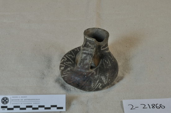 Hearst Museum object titled Jar, accession number 2-21866, described as Donut shaped jar, flat handle, gray with black design.