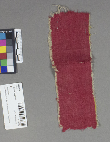 Hearst Museum object titled Textile fragment, accession number 3-28037a, described as Cotton textile fragment.  Satin weave with weft floats.  Red face, consisting of red weft, white warp, traces of yellow weft. 2.5 X 8 inches.
