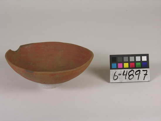 Hearst Museum object titled Bowl, accession number 6-4897, described as Pottery: red elliptical polished bowl, rim chipped