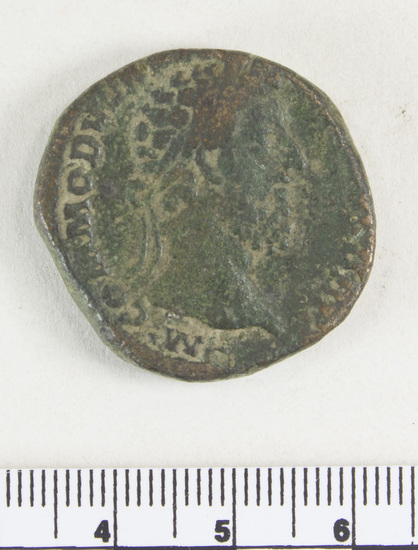 Hearst Museum object 3 of 6 titled Coin: æ sestertius, accession number 8-6480, described as Coin: Sestertius; Æ; Commodus Ru. Aequit[a]s - 24.4 gm. Obverse: M COMMODVS A[NT P FELIX AVG BRIT] - Head laureate facing right. Reverse: [PM TRP XI] IMP VII COS[V P P ]; SC - Aequitas standing facing front holding scales in right hand, cornucopiae in left.