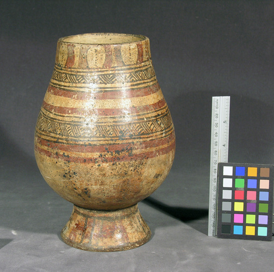 Hearst Museum object titled Vase, accession number 3-26774, described as Vase with pedestal base; polychrome encircling geometric bands. 22 cm high.