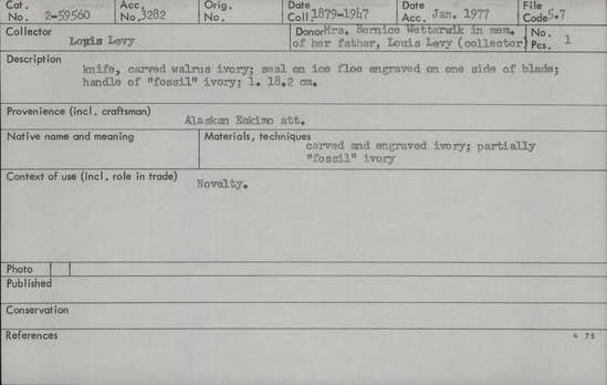Documentation associated with Hearst Museum object titled Knife, accession number 2-59560, described as Made of carved walrus ivory.  Seal on ice floe engraved on one side of blade.  Handle of "fossil" ivory.