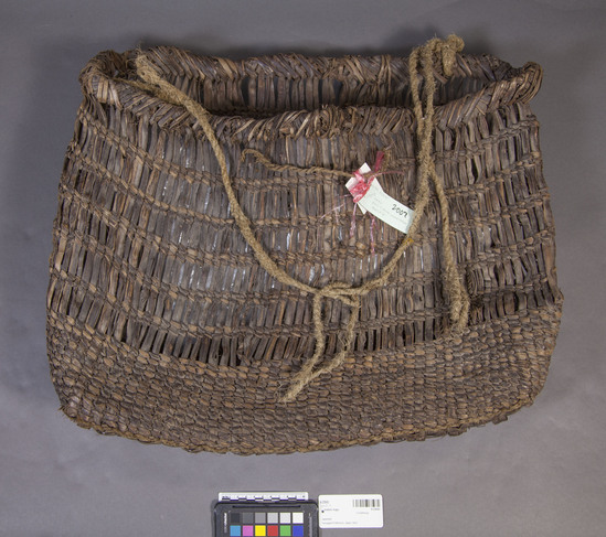 Hearst Museum object titled Basket, kago, accession number 9-23043, described as Large basket, or "kago," woven from wild grapevine bark ("budo") and linden bast ("shina") with rice straw ("wara") cords. Notice: Image restricted due to its potentially sensitive nature. Contact Museum to request access.