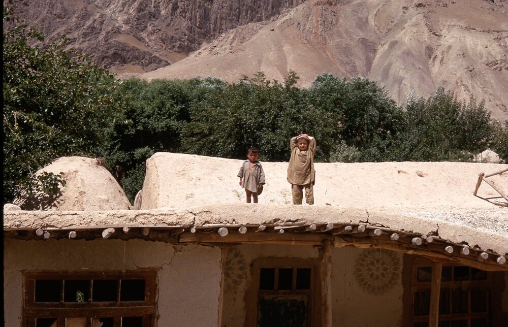 Hearst Museum object titled Color slide, accession number 25-30392, described as two (2) children on a roof