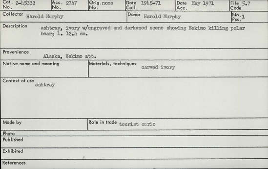 Documentation associated with Hearst Museum object titled Ashtray, accession number 2-45333, described as Made of ivory, with engraved and darkened scene showing Eskimo killing polar bear.