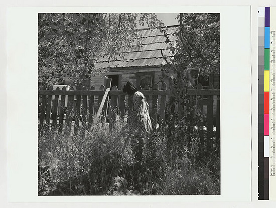 Hearst Museum object titled Black-and-white negative, accession number 15-19578, described as Girl and house