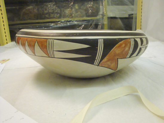 Hearst Museum object 2 of 2 titled Bowl, accession number 2-18704, described as Ceramic, incurving at rim, sharply incurving at base, polished white, interior and exterior design combining linear and curvilinear elements in black and red, black framing lines and rim, frog figure on base, worn. Molded and painted.