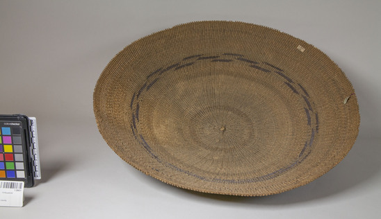 Hearst Museum object 2 of 3 titled Tray, accession number 1-28431, described as Twined basket tray.  2 brown bands in design.