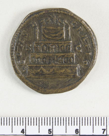 Hearst Museum object 5 of 8 titled Coin: æ sestertius, accession number 8-4879, described as Coin; AE; Sestertius; Roman. 32 mm. Commodus, 180 AD. Rome, Italy. Obverse: DIVVS M ANTONINVS PIVS, bust of Divus Marcus r.. Reverse: CON SE CRATIO, funeral pyre with Marcus Aurelius in quadriga on top; in field, S C.