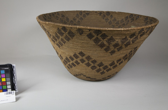 Hearst Museum object 2 of 2 titled Basket, accession number 1-28448, described as Coiled basket, flaring, brown design.