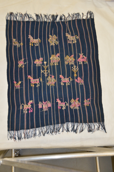 Hearst Museum object 6 of 15 titled Tzute, accession number 3-28276, described as [ cat card DESCRIPTION:  Kerchief, Tzute Materials: Cotton, silk Technique: Plain weave, warp faced,  brocaded Colors:  Blue ground varicolored designs Dimensions:  31 x  24  " Remarks:  Animal, bird motives    ]