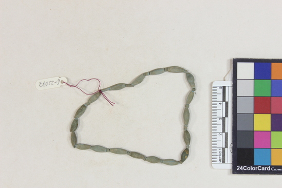 Hearst Museum object titled Beads, accession number 6-22077, described as beads, angular, of gray-blue frit