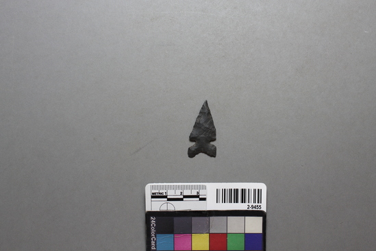 Hearst Museum object titled Projectile point, accession number 2-9455, described as Stemmed arrowpoint, dark gray color