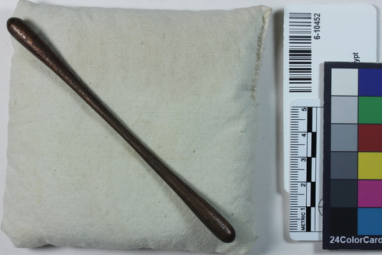 Hearst Museum object titled Applicator, accession number 6-10452, described as bronze applicator stick for eye paint. length 11.7 cm