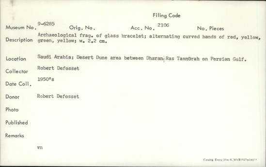 Documentation associated with Hearst Museum object titled Bracelet, accession number 9-6285, described as Archaeological fragment of glass bracelet; alternating curved bands of red, yellow, green, yellow.