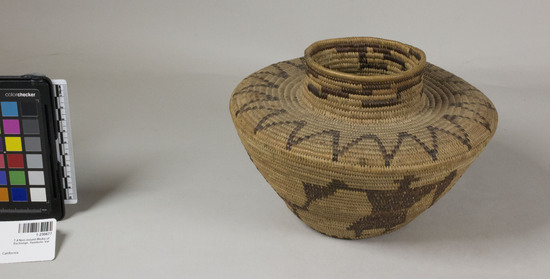 Hearst Museum object 2 of 3 titled Basket, accession number 1-230677, described as Coiled, necked, jar-shaped with 4 standing anthropomorphic figures in redbud on body; zigzag band in redbud on shoulder; minute traces of feathers.