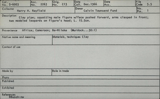 Documentation associated with Hearst Museum object titled Carved pipe bowl, accession number 5-6003, described as Clay pipe; squatting male figure with face pushed forward, arms clasped in front; two modeled leopards on figure's head; L. 15.5 cm.