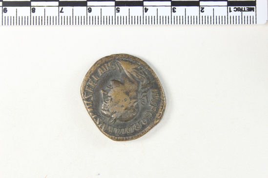 Hearst Museum object 8 of 8 titled Coin: æ sestertius, accession number 8-5921, described as Coin: Sestertius; Æ; Gordianus.Pius - 17.17 grams. Rome, 240-244 AD. Obverse: IMP GORDIANVS PIVS FEL AVG - bust facing right, laureate, draped, cuirassed. Reverse: FELICI T TEMPOR, SC - Felicitas standing holding long caduceus and cornucopiae.