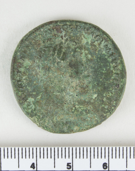 Hearst Museum object 8 of 14 titled Coin: æ sestertius, accession number 8-4009, described as Coin; AE; Sestertius; Roman. Trajan, 104-111 AD. Rome, Italy. Rev.: S P Q R OPTIMO PRINCIPI, Roma helmeted in military dress standing l., holding Victory in right hand, upright spear in field; Dacian kneeling at her feet; S C. in field. CF coin 4008.