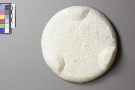 Hearst Museum object titled Plate, accession number 9-11612, described as Slab, round, flat, of white marble. Diameter 19 cm, height 3 cm.