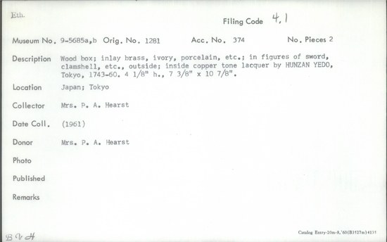 Documentation associated with Hearst Museum object titled Box, accession number 9-5685a,b, described as Wood box; inlay brass, ivory, porcelain, etc.; in figures of sword, clamshell, etc.; outside; inside copper tone lacquer by HUNZAN YEDO, Tokyo, 1743-60; height 4 1/8 in, 7 3/8 in x 10 7/8 in