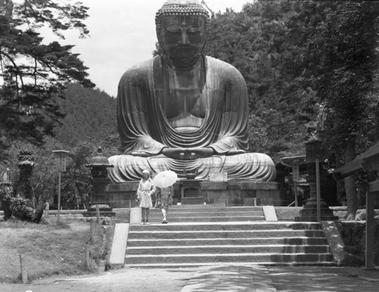 Hearst Museum object titled Black-and-white negative, accession number 15-30665, described as 4 x 5" Negative. Kamakura, Japan. Great Buddha statue. Hoefler's original description: "Kamakura, Japan. The Daibutsu, or Great Buddha, at Hase, is one of the most notable monuments in Japan. In the year 737 A. D. the Emperor Shomu, a sincere devotee to Buddhism, caused numerous monasteries to be erected throughout Japan, and among the other churches thus builded is what known as the Ko-toku-in at Kamakura. In the grounds of this monastery was later erected the colossal bronze image known as the Great Buddha, which has withstood the ravages of time and the fury of the elements and is still in an excellent state of preservation.