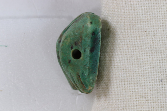 Hearst Museum object 6 of 9 titled Amulet seal, accession number 6-22123, described as Pyramidal amulet-seal; 16x17 mm, of greenish faience