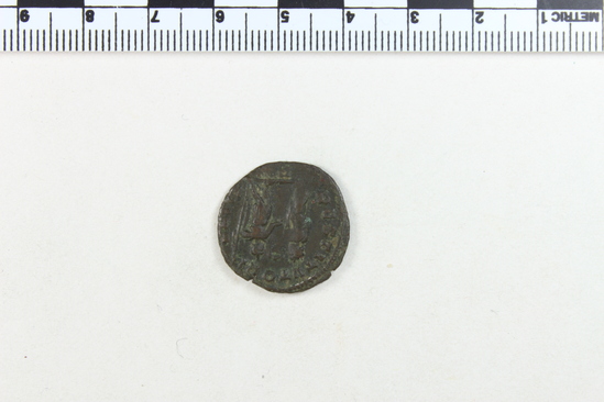 Hearst Museum object 5 of 8 titled Coin: billon antoninianus, accession number 8-4075, described as Coin; Billon; Antoninianus; Roman. 2.81 grams, 22 mm. Aurelian, 270-275 AD. Mediolanum, Italy. Obverse: IMP C AVRELIANVS AVG, Bust r. radiate. Reverse: RESTITVT ORIENTIS, female standing r. presents wreath to emperor in armor, in exergue P