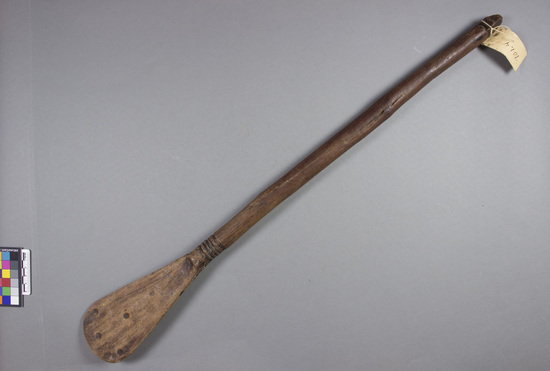 Hearst Museum object titled Paddle, accession number 5-4402, described as Paddle; carved wood with burned design; 66 cm l.