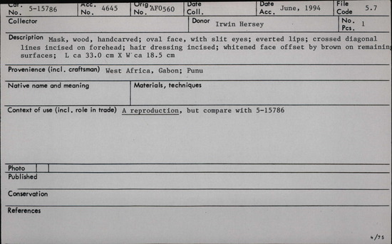 Documentation associated with Hearst Museum object titled Mask, accession number 5-15786, described as Mask, wood, handcarved; oval face, with slit eyes; averted lips; crossed diagonal lines incised on forehead; hair dressing incised; whitened face offset by brown on remaining surfaces; Length: 33 cm, Width/breadth: 18.5 cm