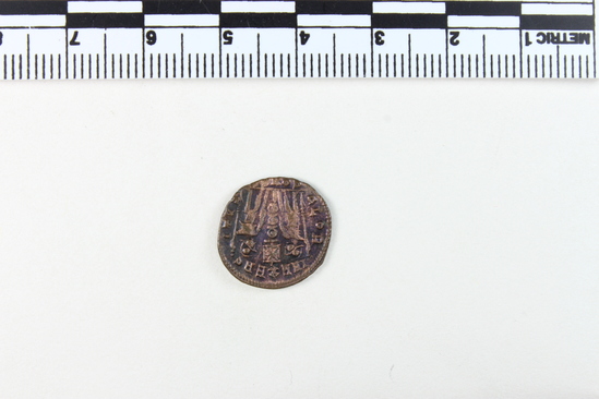 Hearst Museum object titled Coin: æ 3, accession number 8-7283, described as Coin AE 3 Reverse: 2 Standards between soldiers