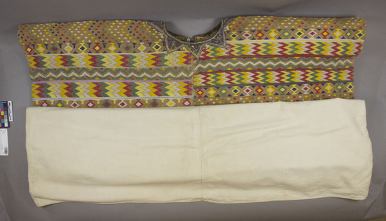 Hearst Museum object 2 of 4 titled Huipil, accession number 3-37, described as Woman’s garment (huipil); white cotton, plain weave; upper part brown cotton, plain and twill weaves with multicolored brocade in cotton and silk; neck bound with fabric and embroidered; approximately 93 cm wide, 1 m long