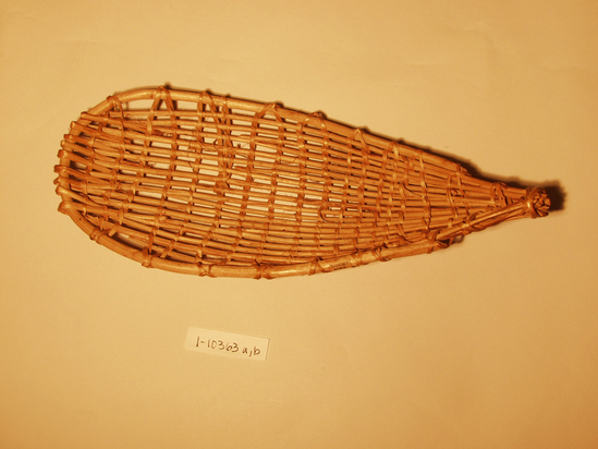 Hearst Museum object 5 of 8 titled Racket, accession number 1-10363a,b, described as Basket racket;  warp is Willow (Salix), weft is Maple (Acer macrophyllum). Open plain twined, peeled shoots, with no decoration.