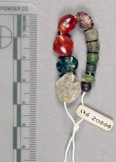 Hearst Museum object titled Beads, accession number 6-20844, described as crystal, carnelian, stone beads. XII Dynasty, Middle Empire