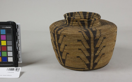 Hearst Museum object 2 of 2 titled Basket, accession number 1-70493, described as Basket, coiled, bottle-neck. (The following fide L. Dawson, 1973):  Highly unusual: made with a double coil throughout. Note gap in base line and double coil ending at top.