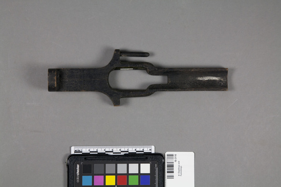 Hearst Museum object titled Lock, accession number 10-3110, described as Incomplete locking device, possibly for a door. Dark-stained wood