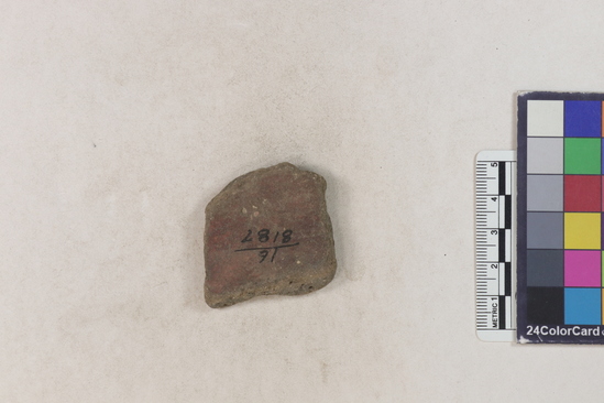 Hearst Museum object titled Potsherd, accession number 16-8187, described as Potsherd: body, red slip Section of Manta on beach currently inhabited. Numbers  8111 to 8194 are sherds picked up on beach at low tide.