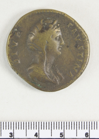 Hearst Museum object 6 of 8 titled Coin: æ sestertius, accession number 8-6002, described as Coin: Sestertius; Æ; Faustina [approximately symbol] 24.66 grams. Obverse: DIVA  FAVSTINA  - Bust facing right, veiled, draped. Reverse: AETER   NITAS, SC in field; Fortuna, draped, standing facing left, holding globe on extended right hand and long rudder, vertical, in left.