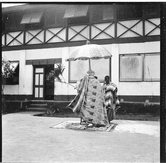 Hearst Museum object titled Black-and-white negative, accession number 15-31357, described as Black-and-white negative, Nigeria, Ijebo Ode, the Awnjale (king) in front of palace, 1951