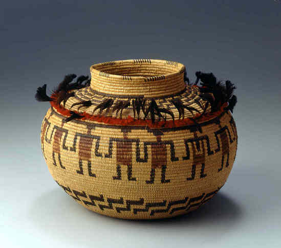 Hearst Museum object titled Basket, accession number 1-20935, described as Jar basket; coiled. Warp is Epicampes (Sporobolus rigens), weft is Willow (Salix). Red pattern is Yucca in wool, black pattern is Break fern (Sporobolus rigens). Bottle neck coiled basket with band of human figures in red and black, band of quail plumes and yarn.