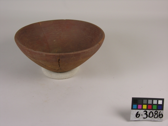 Hearst Museum object titled Broken bowl, accession number 6-3086, described as Pottery, red bowl, broken; diameter 26 cm, height 11 cm